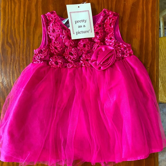 Pink baby dress with sequins - Picture 1 of 2
